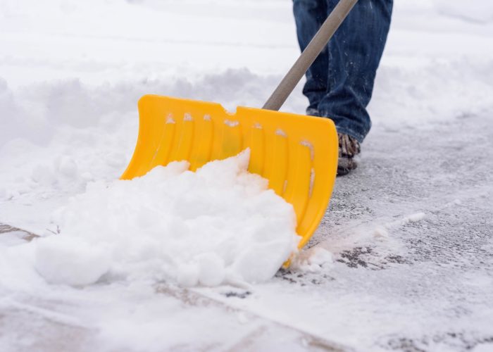Shoveling snow in winter